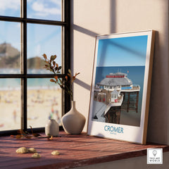 Cromer Norfolk Wall Art – Historic Seaside Pier Art Print displayed in a sunlit room with a coastal view.