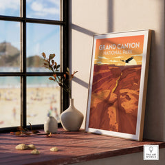 Framed Grand Canyon National Park travel poster on a windowsill with vases and natural wood decor.