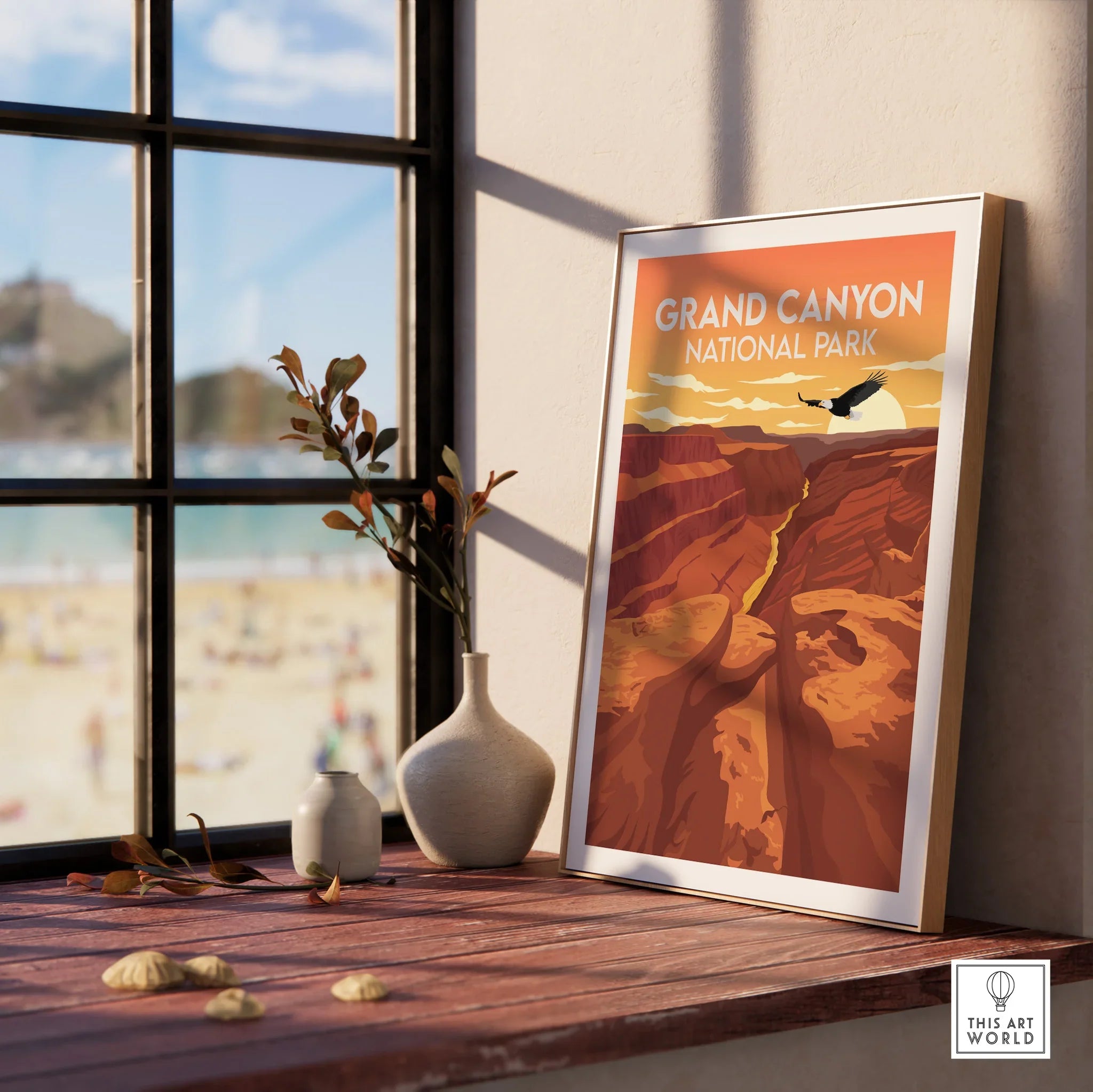 Framed Grand Canyon National Park travel poster on a windowsill with vases and natural wood decor.