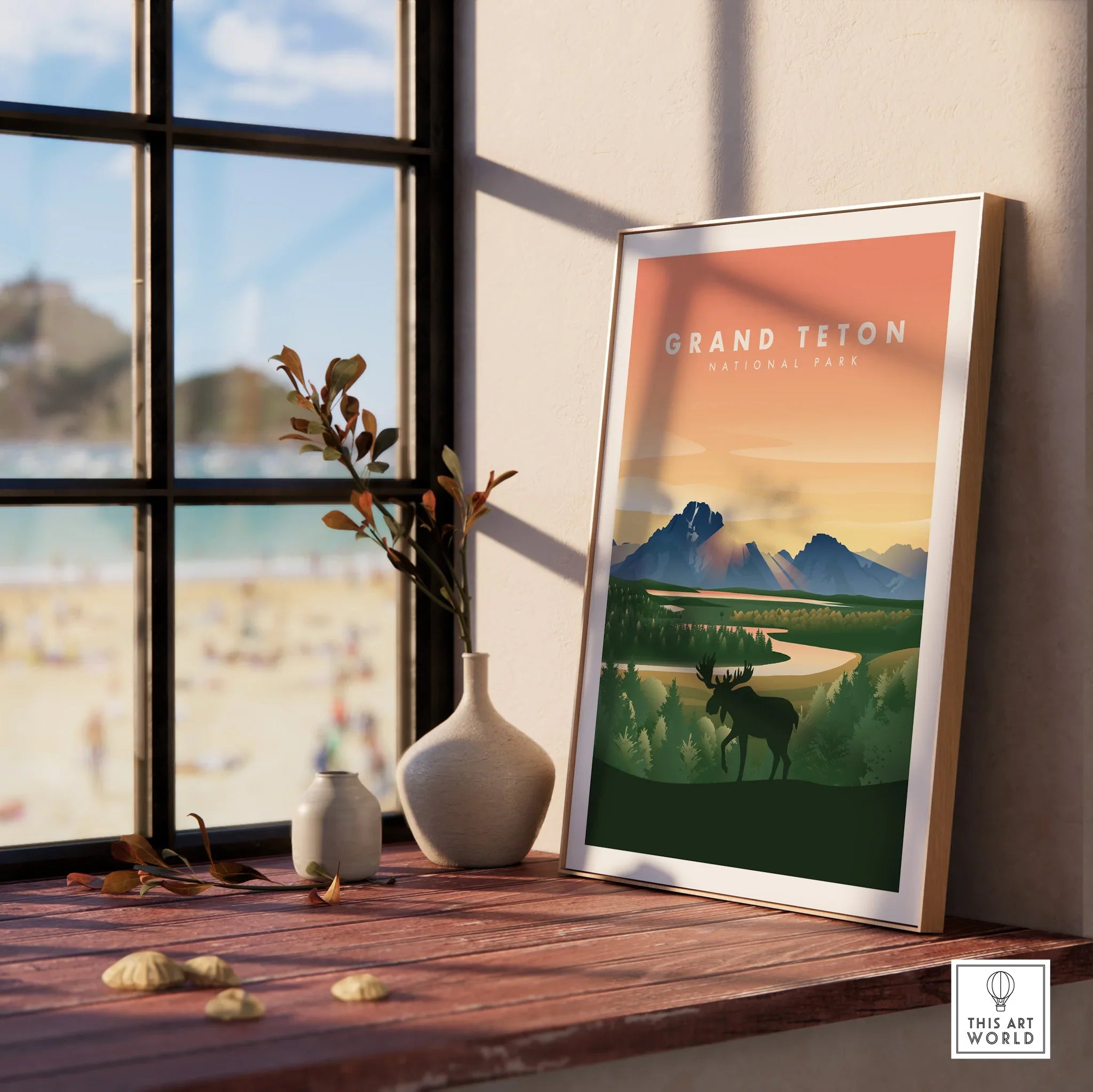 Framed Grand Teton National Park travel print on windowsill with vases, scenic landscape art