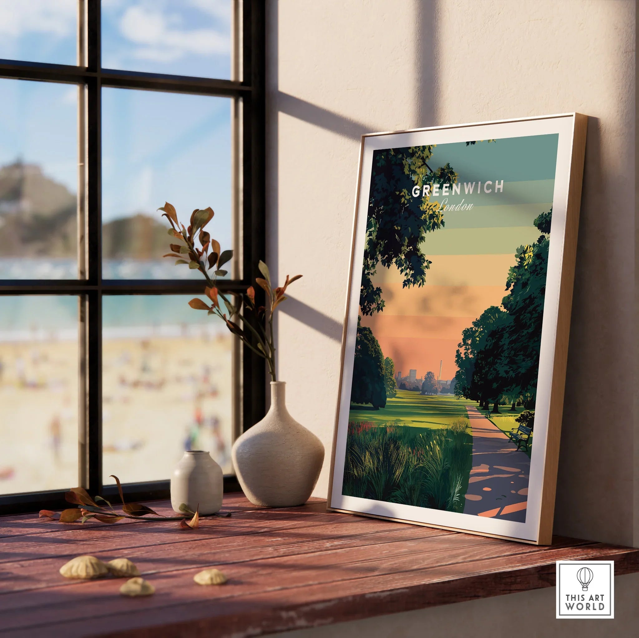 Framed Greenwich London travel poster on sunny window ledge with vases and outdoor view.