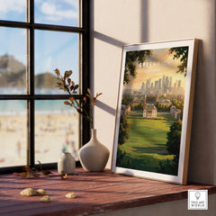 Framed Greenwich London travel poster on window ledge with vases and cityscape wall art