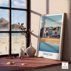 Herne Bay Kent Canvas Print Poster displayed on a wooden table by a window with a coastal view.