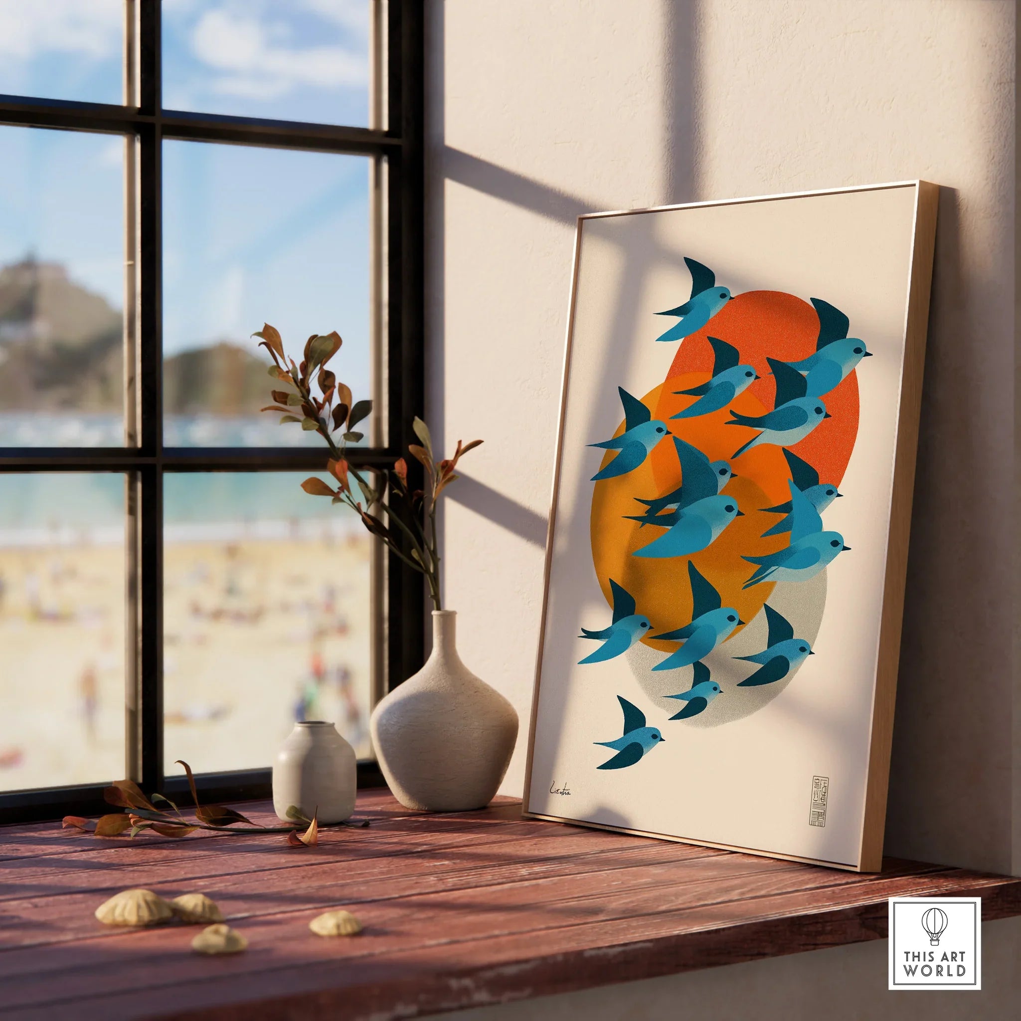 Framed art print of blue birds with orange sun on window sill, modern home decor