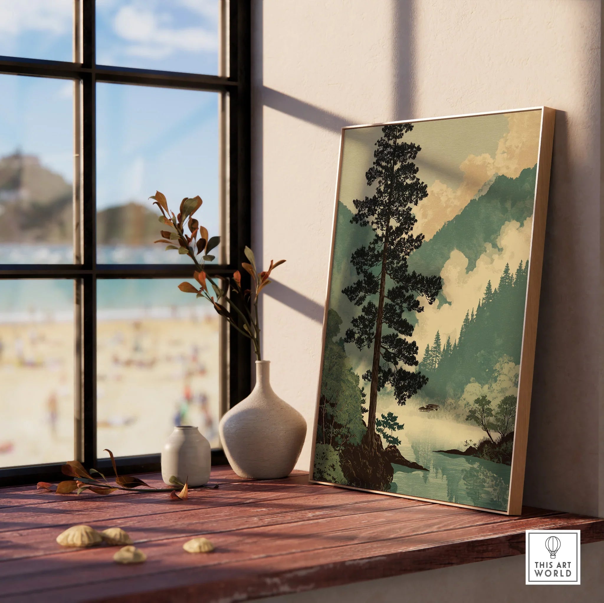 Framed Japanese woodblock art print with pine tree and mountain landscape on window sill