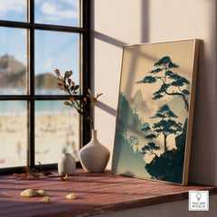 Framed Japanese woodblock art print with mountain scenery on a windowsill with ceramics