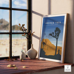 Framed Joshua Tree National Park print on a windowsill with desert landscape art