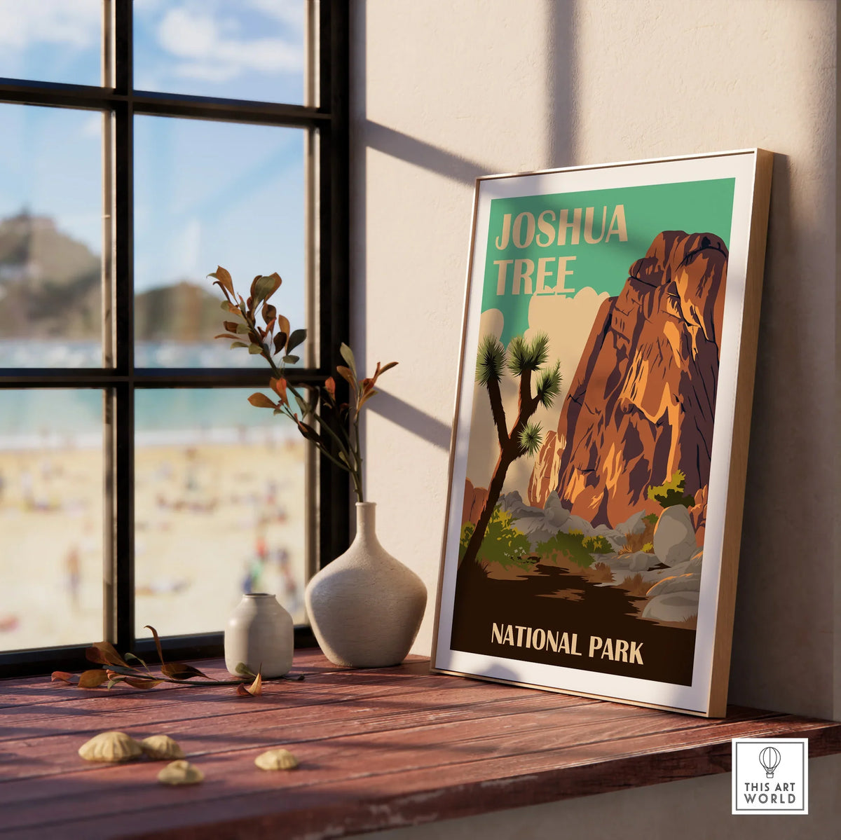 Framed Joshua Tree National Park print on window ledge with decorative vases and plants.