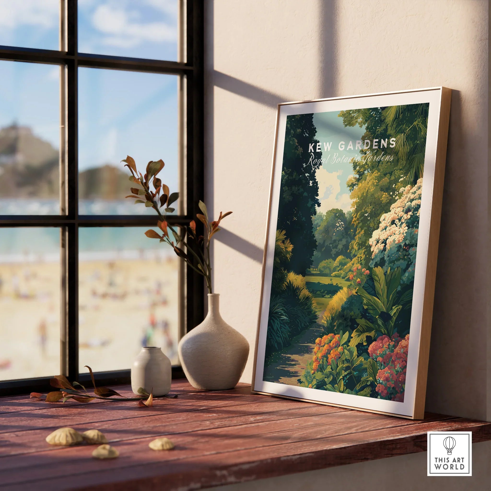 Framed Kew Gardens botanical art print on windowsill with vases and beach view outside