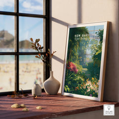 Framed Kew Gardens botanical art print on windowsill with vases and beach view outside window