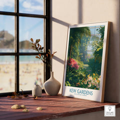 Framed Kew Gardens botanical art print on windowsill, vases and beach view in background