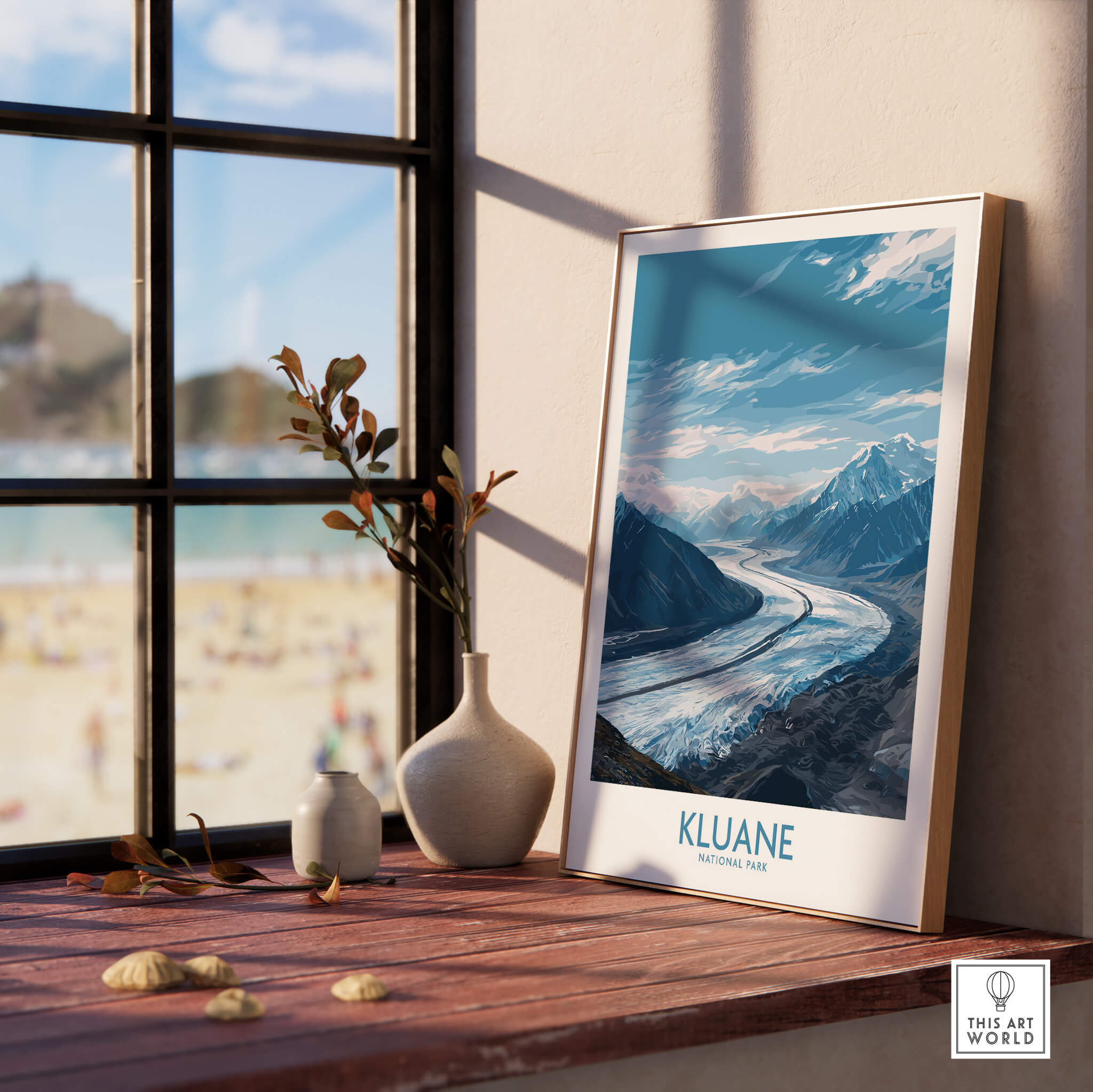 Kluane Poster National Park Canada | Snow Capped Mountains Canvas Print displayed on a windowsill with beach view.