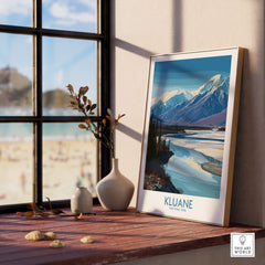 Kluane National Park Canada Poster | Blue Glacier Water Landscape Canvas Print displayed on a wooden table with a scenic background.