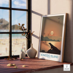 Komodo Island travel poster in natural wood frame on windowsill, with beach view and vases