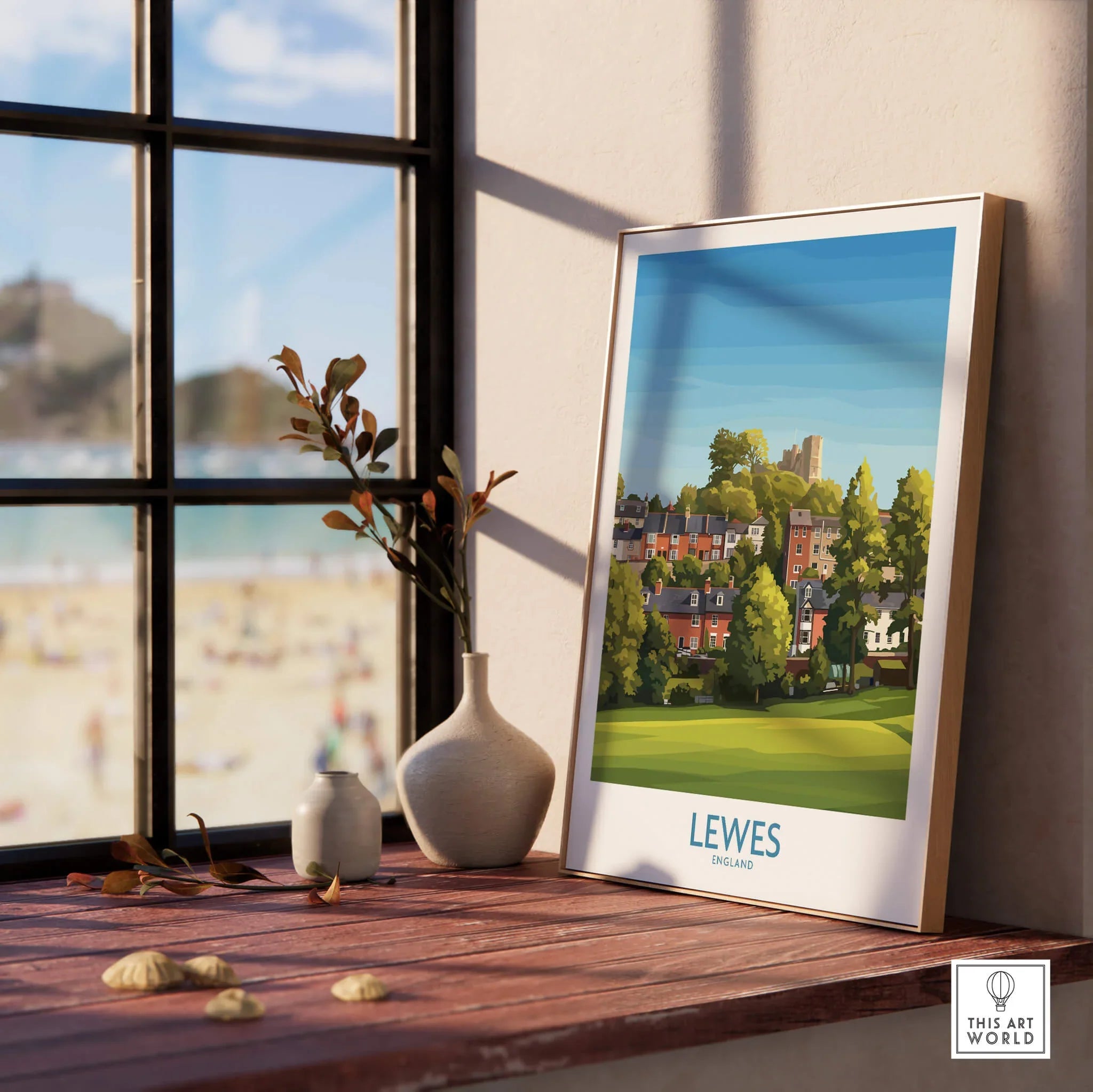 Lewes travel poster in natural wood frame on windowsill, modern home decor with vases