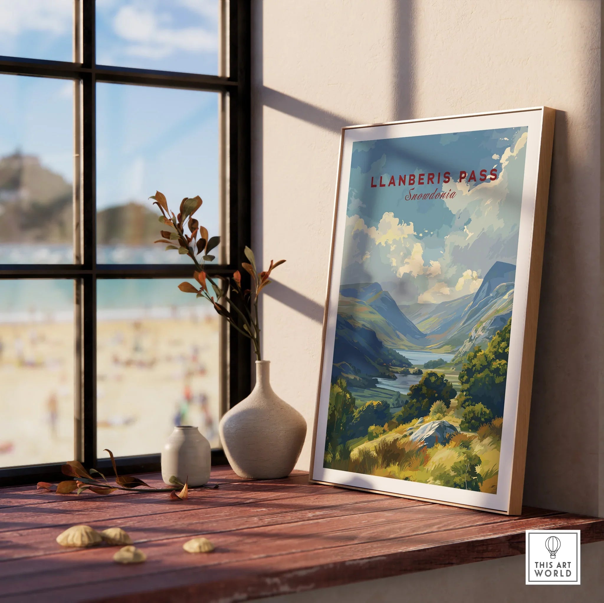 Framed Llanberis Pass wall art print on window sill with vases, landscape poster decor