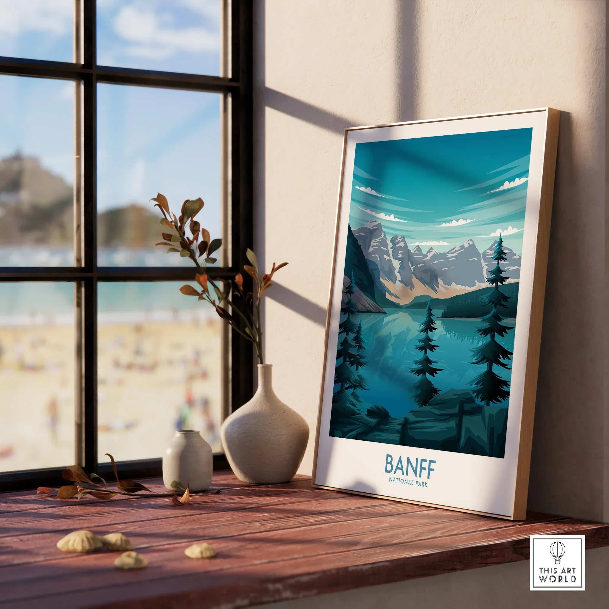 Framed Banff National Park print on windowsill with vases, mountain and lake wall art