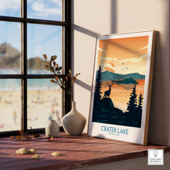 Framed Crater Lake National Park art print on windowsill, with natural wood frame and vases.