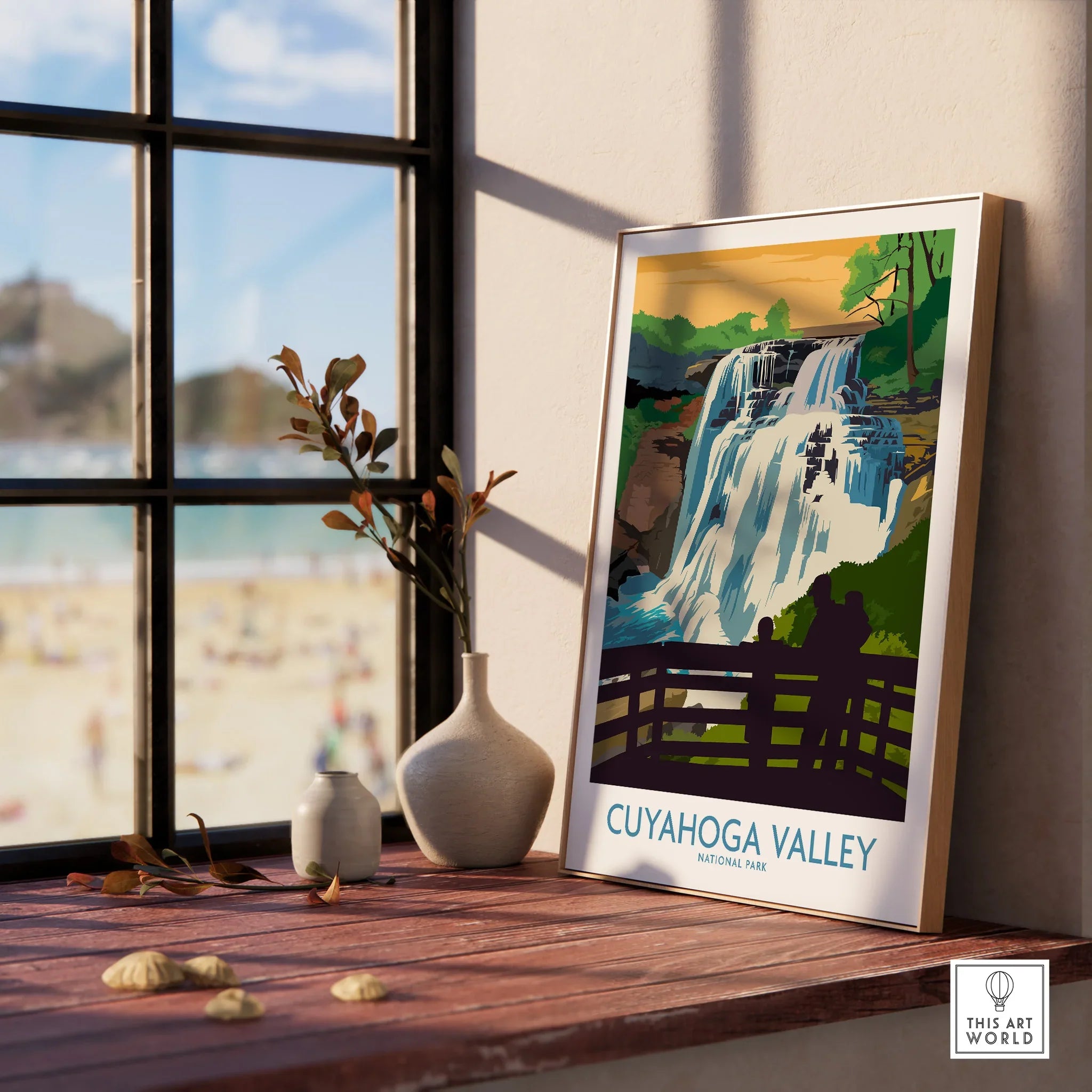 Framed Cuyahoga Valley National Park waterfall print on wood windowsill with vases