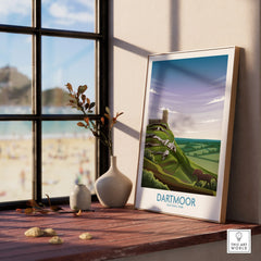 Dartmoor National Park art print in natural wood frame on windowsill with vases and beach view