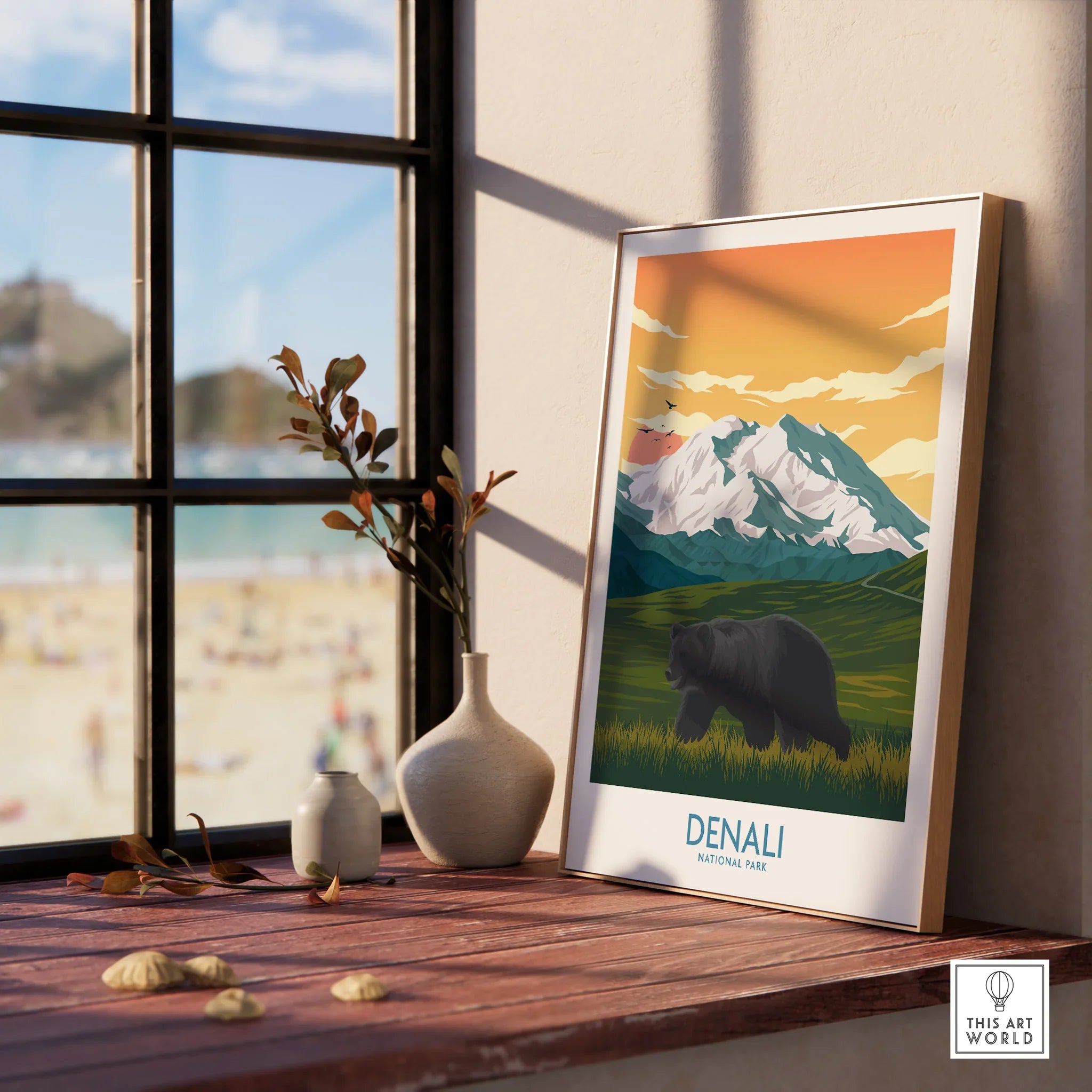 Denali National Park travel poster with bear and mountains in wood frame on windowsill