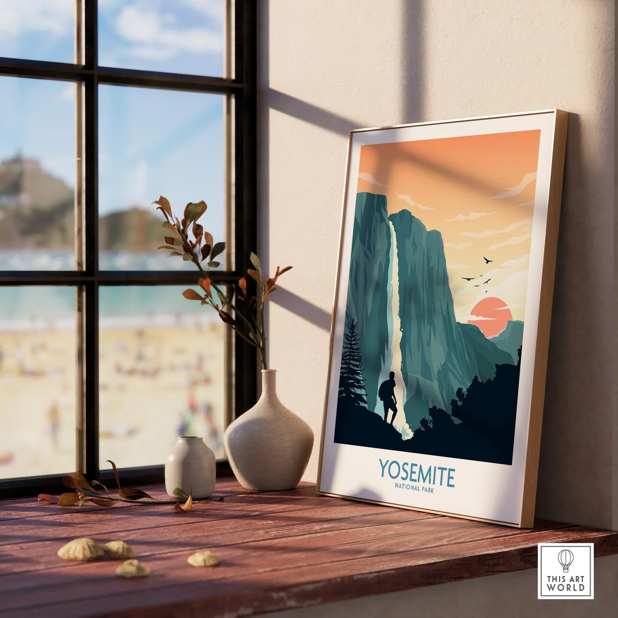 Framed Yosemite National Park art print on windowsill with vases and scenic decor