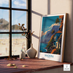 Framed Madeira Portugal travel poster on a sunny window sill with vases and beach view