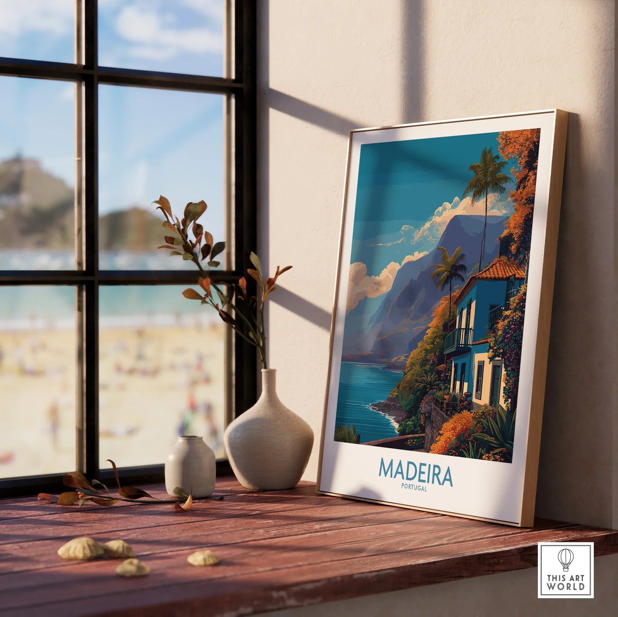 Framed Madeira Portugal travel poster on a sunny window sill with vases and beach view