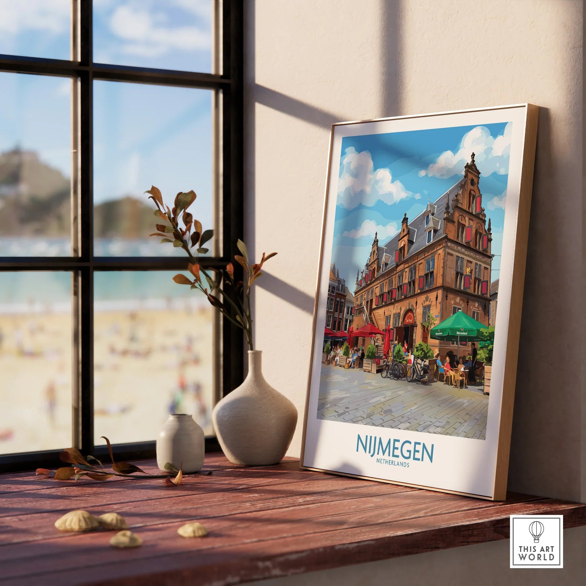 Framed Nijmegen Netherlands city travel poster on windowsill with vases and beach view.