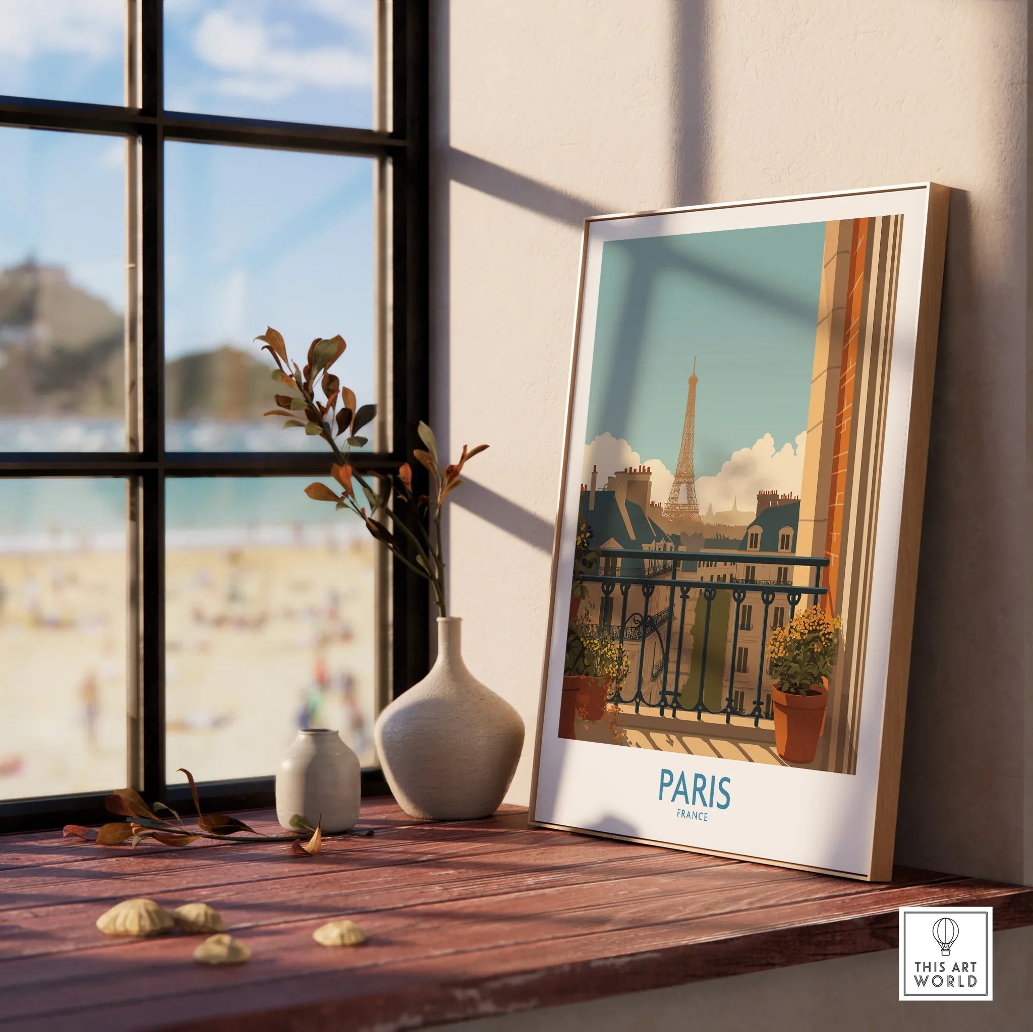Framed Paris travel poster with Eiffel Tower, styled on wooden windowsill with vases.