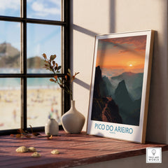 Framed Pico do Arieiro Madeira travel poster on wooden windowsill with vases, sunset mountain art.
