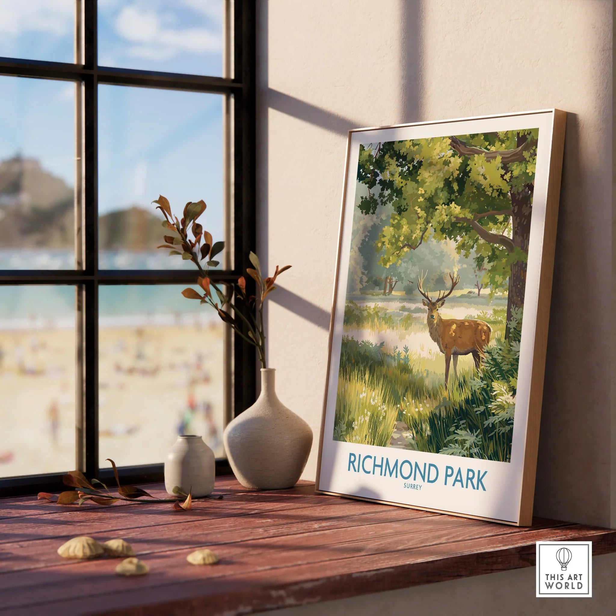 Framed Richmond Park art print featuring a stag, displayed on a sunlit windowsill with vases.