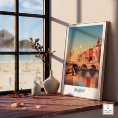 Rimini Italy Poster | Vintage Vespa & Historic Bridge Canvas Print displayed in a cozy setting by the window.