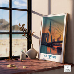 Framed Rotterdam city skyline art print with bridge on wooden windowsill, beach view outside
