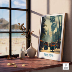 Siem Reap Cambodia Print | Canvas Poster framed on a table with a beach view, showcasing vibrant tuk tuks and palm trees.