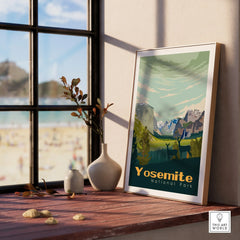 Yosemite National Park framed travel poster on a windowsill with natural wood frame