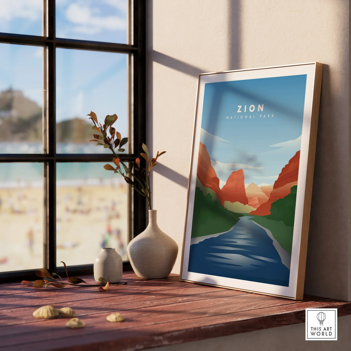 Framed Zion National Park print in natural wood frame on windowsill with vases, home decor