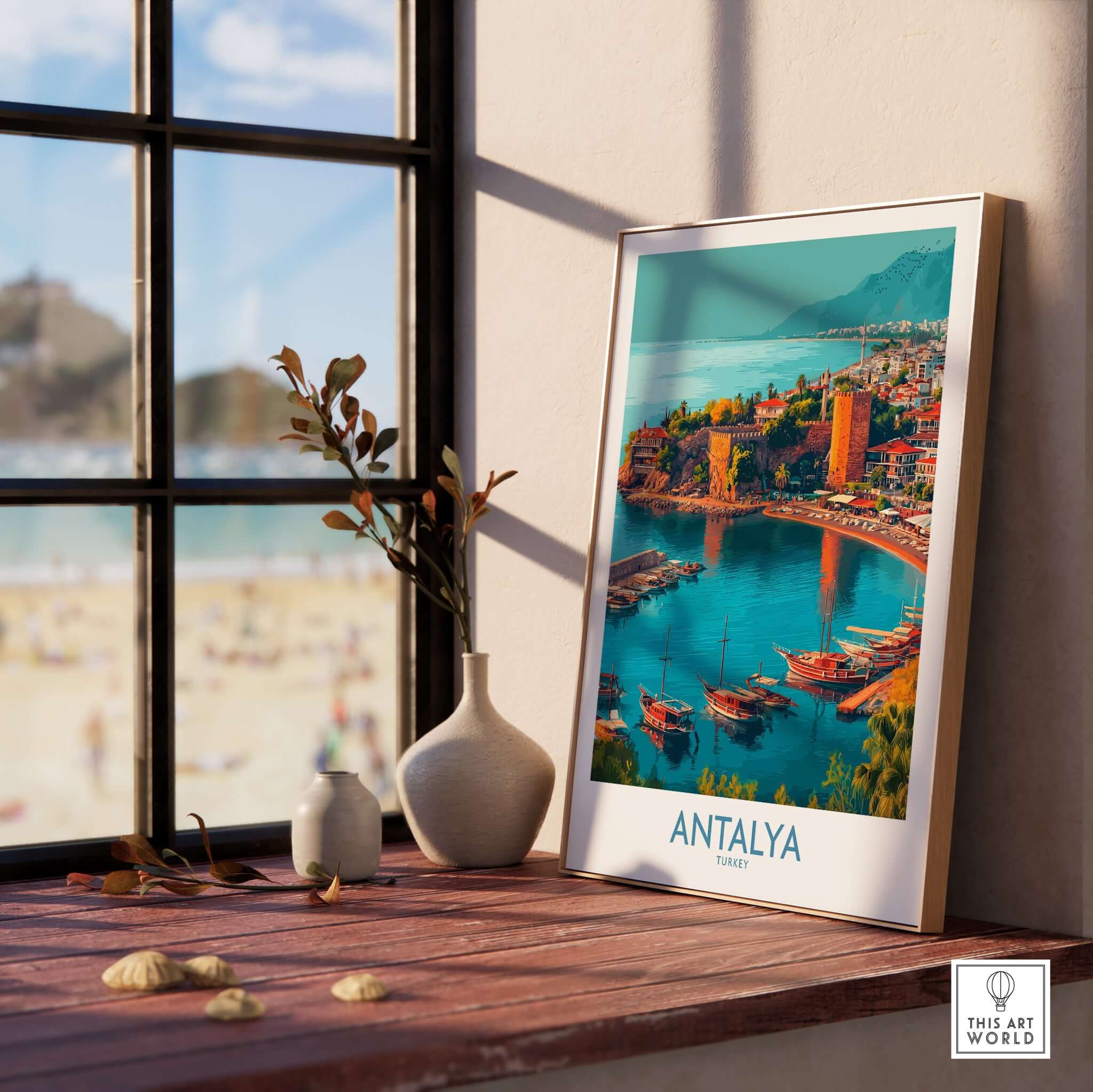 Antalya Turkey Kaleci Port Art Print | Historic Red Tower Poster displayed on a window sill with scenic background.