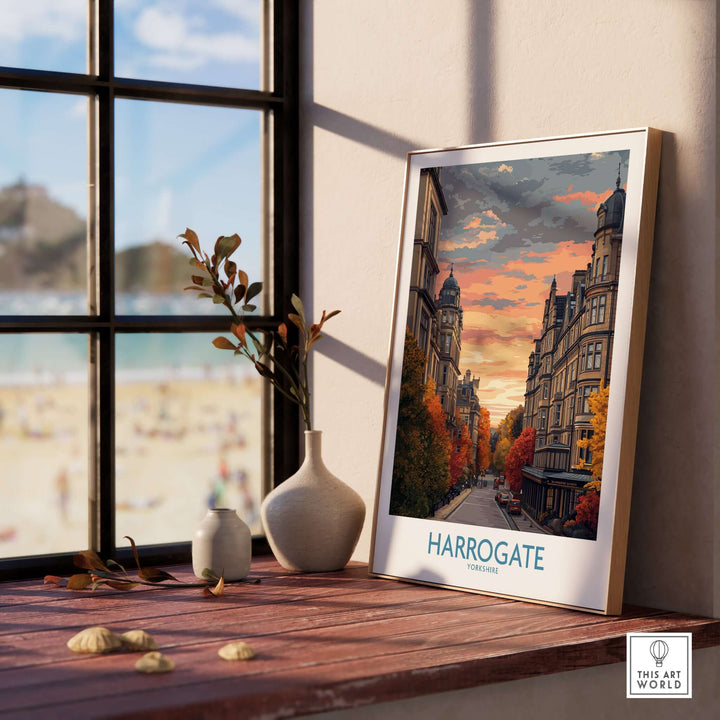 Harrogate Yorkshire Autumn Street Art Print | Sunset Avenue Poster displayed on a windowsill with a scenic view.