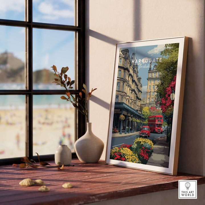 Harrogate Print | English City Wall Decor displayed on a windowsill with beach view, showcasing urban charm.