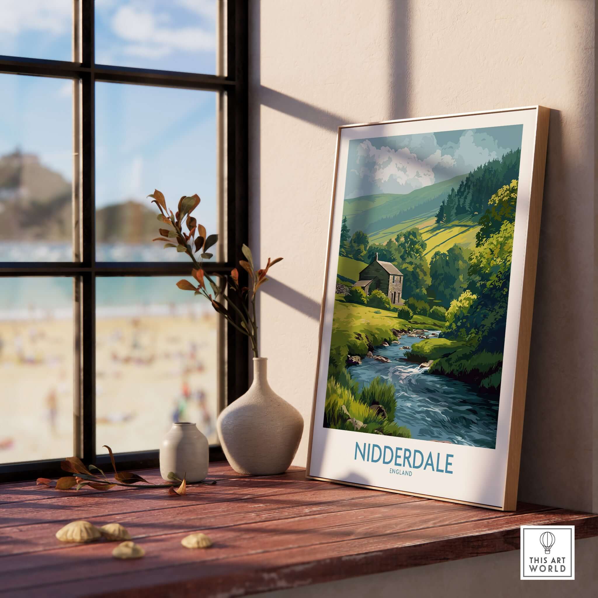 Nidderdale England Riverside Cottage Art Print | Yorkshire Valley Poster displayed on a windowsill with a scenic view.