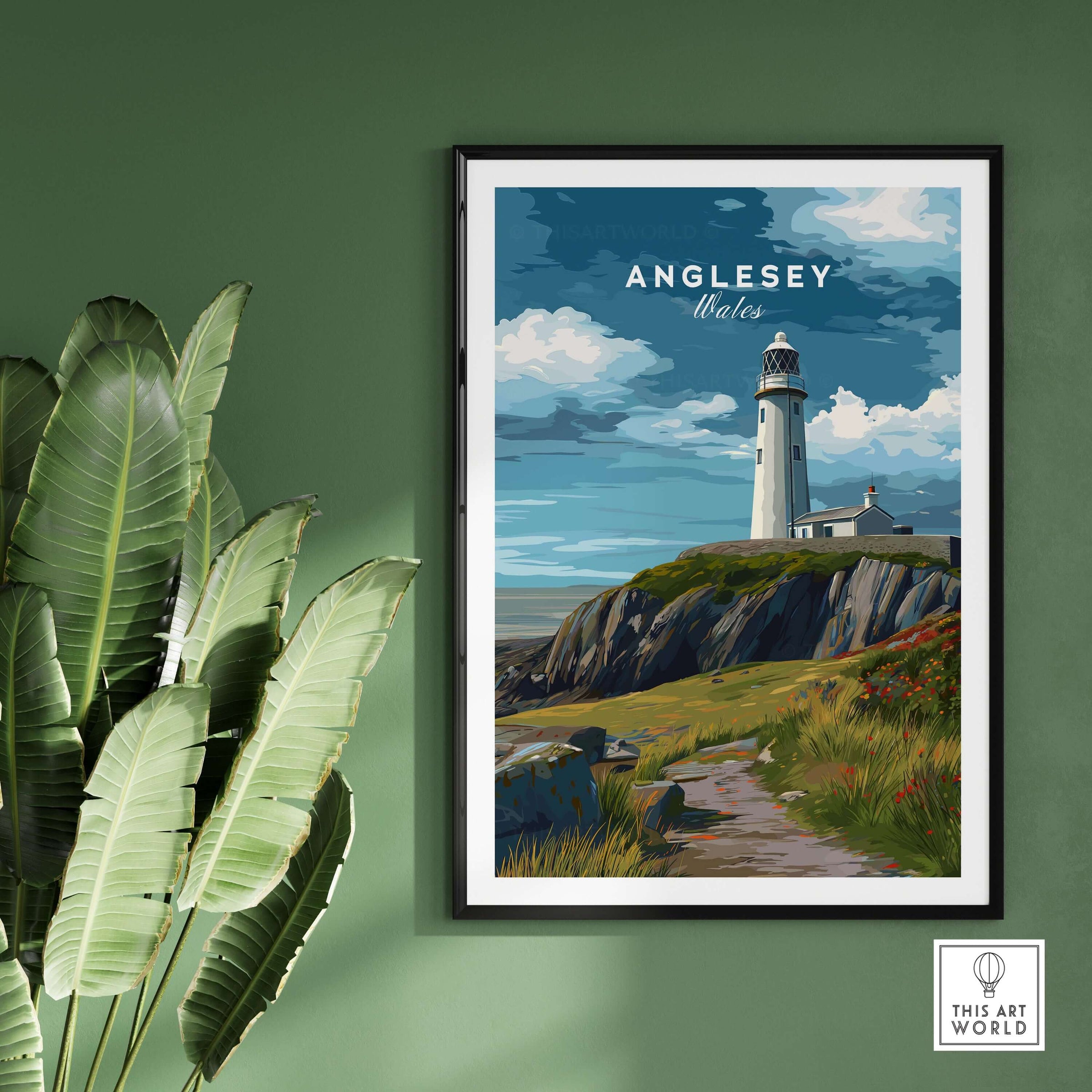 Anglesey Wales Lighthouse on Cliffs Print - Coastal Path Wall Art on green wall with framed print of lighthouse and cliffs.