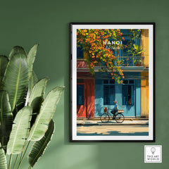 Hanoi Vietnam Print - Vibrant Hanoi Wall Art featuring a cyclist and colorful buildings on a green wall.