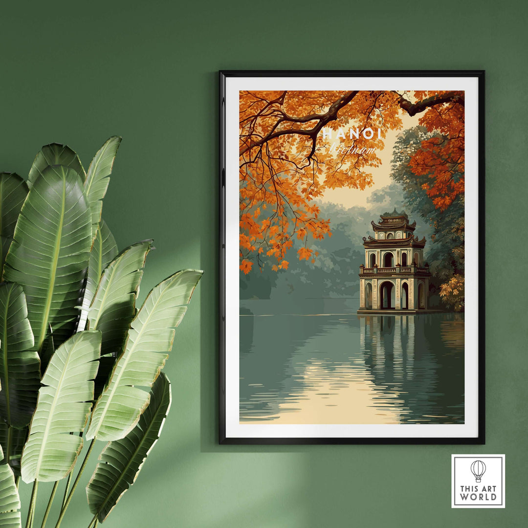 Hanoi Vietnam poster featuring Hoan Kiem Lake Temple, framed with autumn foliage on a green wall.