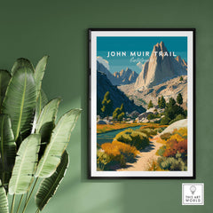 John Muir Trail California Sierra Nevada Mountain Print - Wilderness Hiking Wall Art hanging on a green wall with plants.
