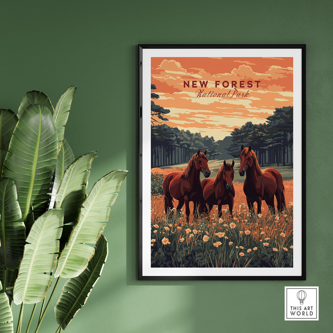 New Forest National Park print with horses and lush landscape, framed and displayed on a green wall with tropical plants.