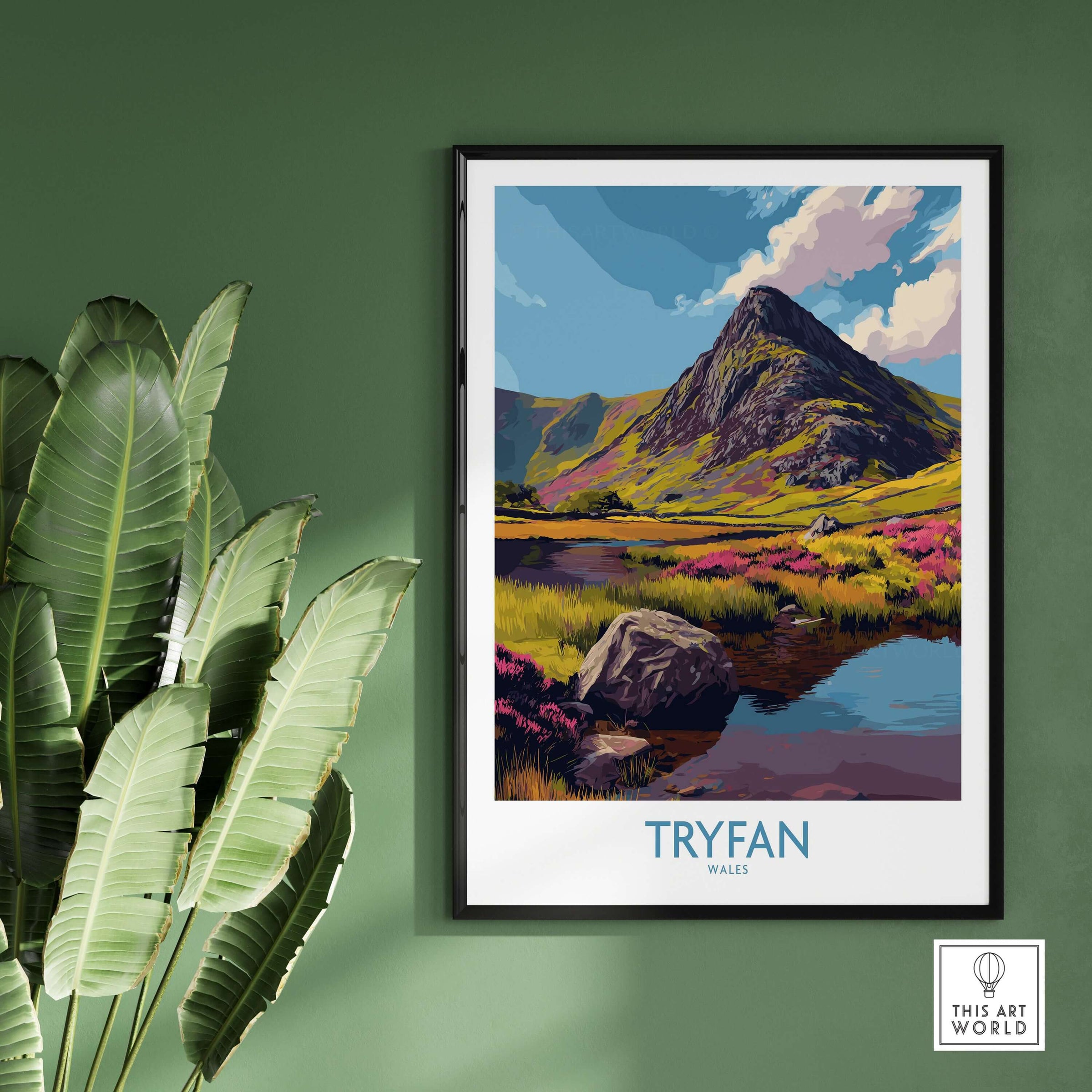 Tryfan Wales Heather Fields Peak Poster - Welsh Wilderness Decor hanging on green wall with plants