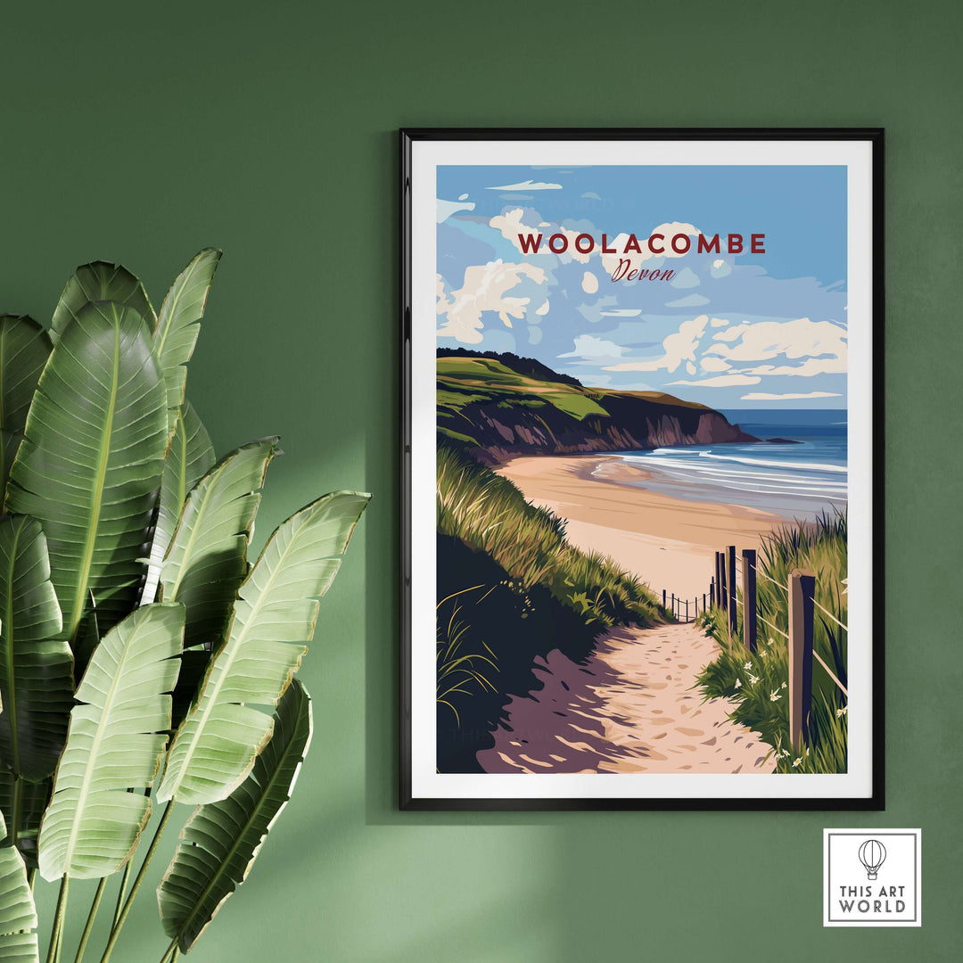 Woolacombe Beach Path Print featuring coastal Devon scenery, framed wall art on a green wall with tropical plants.