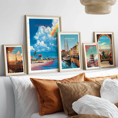 Cocoa Beach Lifeguard Stand Print - Florida Beach Wall Art in a gallery wall set of five framed travel prints in natural wood frames above a bed