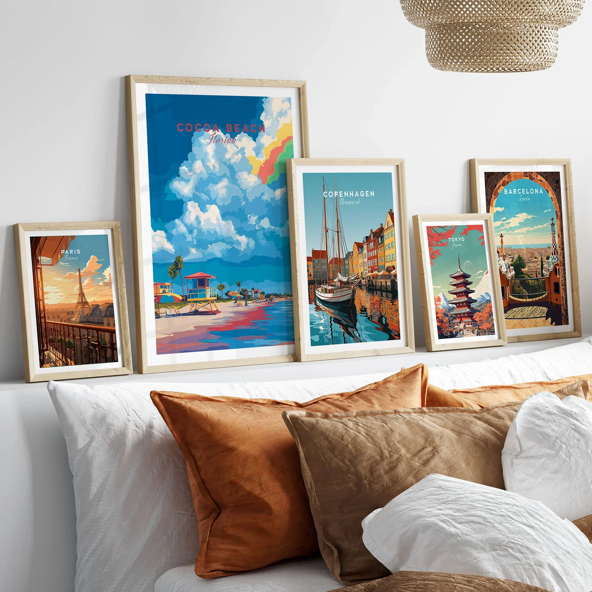 Cocoa Beach Lifeguard Stand Print - Florida Beach Wall Art in a gallery wall set of five framed travel prints in natural wood frames above a bed